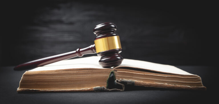 judge gavel book black background