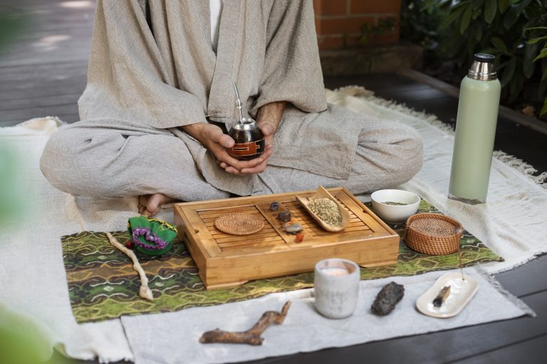 front view man preparing yerba mate