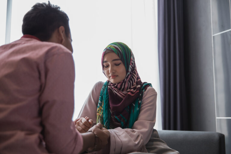 worried muslim woman sharing problem